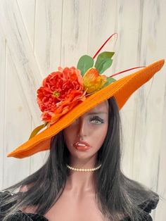 Ready to ship today from Tennessee, USA. I ship quickly and package safely in boxes.  See more  distinctive hat choices at my Etsy shop at https://www.etsy.com/shop/equineelan   This hat has an oversize brim of 6 inches for a total width of 19 inches and is a vibrant rich orange color with a big gorgeous peony flower. The flower is a beautiful mix of peach, pink and coral tones. Two dark orange/coral colored quills kick this hat into Derby Couture. Wear it level on your head or tilt it over one Orange Wide Brim Sun Hat For Spring, Orange Curved Brim Sun Hat For Spring, Orange Wide Brim Sun Hat, Orange Wide Brim Hat For Spring, Orange Curved Brim Hat For Spring, Orange Mini Hat For Kentucky Derby Races, Orange Brimmed Spring Hat, Orange Short Brim Hat For Spring, Orange Wide Brim Straw Hat For Spring