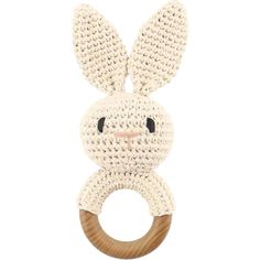 a crocheted bunny ring rattler on a white background