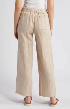 These lightweight linen pants are cut with straight legs and topped with a comfortable elastic-drawstring waist. 29 1/2" inseam; 22" leg opening; 11" front rise; 16" back rise (size Medium) Elastic/drawstring waist Front slant pockets; back patch pockets 100% linen Machine wash, line dry Imported Relaxed Pull-on Straight Leg Bottoms, Relaxed Straight Leg Bottoms With Pull-on Style, Relaxed Straight Leg Pull-on Bottoms, Casual Flax-colored Bottoms For Vacation, Casual Flax Colored Bottoms For Vacation, Comfortable Linen Pants For Vacation, Neutral Relaxed Fit Bottoms For Vacation, Casual Beige Bottoms For Vacation, Neutral Linen Beach Bottoms