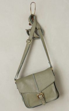 Item Description Condition: New with tag Quantity: 1 Original Retail Price or MSRP: $168.00 Brand/style: Cut N Paste / Kilda Crossbody Bag Color/material:  Olive looks like green moss / Soft Leather Condition: Stored in smoke free environment.This item is authentic and brand new; line-through if applicable (normally inside/tag/bottom) is to prevent return to retail store only. Highlights: Kilda Crossbody Bag by Cut N' Paste • Soft Leather • Cotton lining • Flap magnetic closure • Exterior back zipper pocket • Exterior slip front pocket under foldover flap • 3 Interior compartments ( 2 with zippers) • 1 Interior slip pocket • Braided zipper tassel pull • Gold antique tone hardware Dimensions : • Length: 8" • Depth: 3.5" • Height: 7.5" • Strap Drop: 26" Adjustable Like Green, Unique Bags, Tag Sale, Cut And Paste, Color Stories, Mom Style, Travel Accessories, Front Pocket, Soft Leather