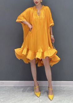 Style Yellow V Neck Low High Design Long Dress SummerFabric: Cotton BlendedSize & Fit: Fit: This garment fits true to size.Length: Size L measures 40.95"from shoulder to hemBust: Great for any cup size. Waist: Loose Fit. Comfortable room throughout midsection.Hip: Loose Fit - room for hips. Hand Wash Cold. Casual V-neck One Size Fits All Dress, Casual V-neck Free Size Dress, Free Size V-neck Dress For Spring, Free Size V-neck Spring Dress, Free-size V-neck Spring Dress, Yellow Shift Dress For Vacation, Beach Tunic Shift Dress, Free Size Summer V-neck Dress, Yellow Tunic Dress For Summer