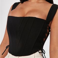 Black | Size Xs Never Worn Black Sleeveless Bandage Corset, Black Fitted Evening Crop Top, Fitted Black Crop Top For Evening, Black Summer Evening Corset, Black Corset For Evening Wear In Spring, Black Bandage Crop Top For Summer, Black Bandage Tops For Party, Chic Black Fitted Corset, Chic Black Corset For Night Out