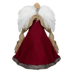 an angel doll with white wings and a red dress