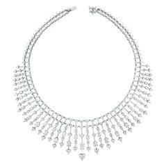 An enchanting necklace ideal for the red carpet, a gala or a royal wedding. The luxurious combination of hearts, ovals and rounds is breathtaking and show stopping. Diamonds Shapes: Heart, Round, Marquise & Oval Center Solitaire: 1.08 ct Heart Shape GH color SI Clarity Total Diamond Weight: 51.25 ct Diamond Color: G - I Diamond Clarity: VS (Very Slightly Included) Metal: 18K White Gold Metal Wt: 83.17 gms Setting: Prong Set Price Quoted may be negotiable. Please contact us to view and discuss. Diamond Chocker, Diamonds Shapes, White Gold Heart Necklace, Graff Diamonds, Bridal Diamond Necklace, Neck Pieces Jewelry, Stones Necklace, Expensive Jewelry Luxury, Gold For Sale