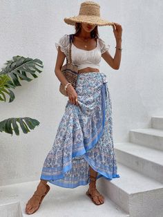 This maxi-length wrap skirt features a multicolor, Boho-style floral and paisley pattern, a high waistline, a knot detail, and a ruffled hem. It is composed of 100% viscose, a non-stretch fabric, and should be either machine washed or professionally dry cleaned. It is unlined and does not come with a belt. Size US Length Waist Size S 4 37.4 28 M 6 37.8 29.5 L 8/10 38.4 31.9 XL 12 39 34.3 Ships in 4-6 daysJoin our mailing list for a 20% off your first order, sign up on the main page Boho Outfits Shein, Grad Brunch, Hippy Skirt, Bohemian Style Skirts, Looks Hippie, Summer Elegance, Boho Mode, Women Bottoms, Maxi Rok