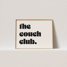 a black and white poster with the words the couch club on it's side