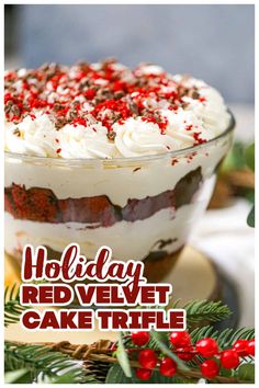 a holiday red velvet cake trifle with white frosting and sprinkles