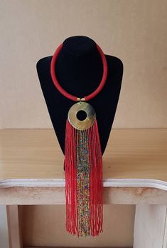 Beatiful women necklace. Main color: Red Available in different colors.  More necklaces here; https://www.etsy.com/shop/PrimeBeadsKe?ref=seller-platform-mcnav&section_id=33399833 All items are shipped through dhl express! Red Beaded Long Necklace With Large Beads, Handmade Red Beaded Choker Necklace, Red Bohemian Choker Necklace, Red Choker Necklace With Colorful Beads, Red Beaded Necklaces With 108 Beads For Jewelry Making, Handmade Red Beaded Necklaces With Round Beads, Unique Red Beaded Necklace With Round Beads, Red Beaded Chain Choker Necklace, Red Beaded Long Necklace