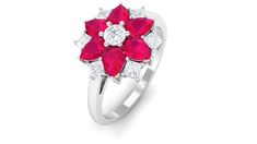 Product Details Blossom in beauty with this Floral Cocktail Ring featuring Ruby and shimmering Diamond gemstones, a stunning statement of elegance and grace. Product Information SKU SHP-RINGS062210019 Weight 3.20 gm (Approximate) RUBY INFORMATION No.of Stones 6 Pieces Total Weight 1.80 Carat (Approximate) Dimension(approx) Pear-3X5 mm-6 Pcs Color Red Cut Brilliant Shape Pear Setting Type Prong-Setting Quality Grade AAA DIAMOND INFORMATION No.of Stones 7 Pieces Total Weight 0.62 Carat (Approximat Ruby Flower, Ring With Ruby, Ruby Diamond Ring, Floral Cocktails, Signature Jewelry, 18k Yellow Gold Ring, July Birthstone, Ruby Diamond, Ruby Gemstone