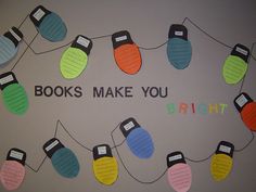 there is a bulletin board with lights on it and the words books make you bright