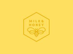 the logo for milk and honey, which is designed to look like a honeycomb