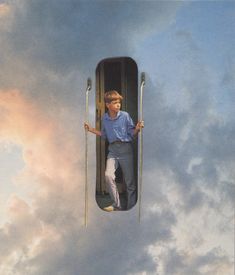 a man is hanging from the side of a train with clouds in the sky behind him