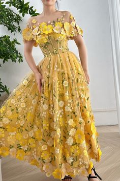 Indulge in the beauty of this Strapless Floral Corset Yellow Dress. The removable cape adds a subtle touch of elegance to this luxurious piece. Perfect for any special occasion, this dress will make you feel sophisticated and timeless. Own the room in this stunning, one-of-a-kind design. Bust and Skirt with full lining. 100% Polyester 100% Recycled polyester lining Concealed zip at centre back Imported Yellow Floral Party Dress, Yellow Dress Floral, Yellow Dress Corset, Strapless Yellow Floral Dress, Yellow Floral Print Dress For Dress-up Occasions, Floral Yellow Dress, Yellow Flower Dress, Floral Floor, Short White Dress Wedding