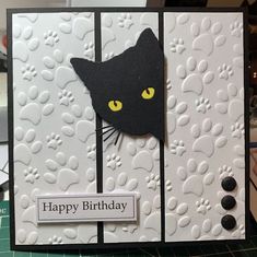 a card with a black cat on it