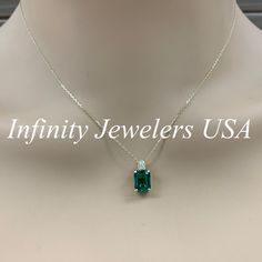 "The pendant pictured is a lab created emerald and diamond #6648 -Approximate total carat weight: approx. 2.55ctw diamond equivalent -Center Stone Size: 9x7mm - approx. 2.50ct diamond equivalent -Center Stone Shape: emerald cut -Gem Type: lab created emerald -Stone Clarity: VS2 -Stone Color: Green -Moh's Scale: 8.5 hardness -Accent Stone Size: round approx. 0.04ct. diamond equivalent -Gem Type: genuine diamond -Stone Clarity: SI1 -Stone Color: G -Moh's Scale: 10 hardness -Metal Type and Purity: Dazzling Emerald Necklace With Diamond Accents For Anniversary, Dazzling Emerald Necklace For Anniversary, Dazzling White Gold Emerald Necklace For Anniversary, Emerald Necklaces With Diamond Accents For Anniversary, Formal Gia Certified Emerald Necklace, Gia Certified Green Necklace For Formal Occasions, Formal Green Gia Certified Necklace, Classic Cubic Zirconia Emerald Necklace, Classic Emerald Necklace With Diamond For May Birthstone