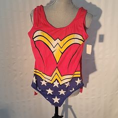 Dc Comics Wonder Woman Bodysuit With Attachable Cape Size: Xl (15/17) Jr, 95% Cotton, 5% Spandex, Machine Wash Cold, Nwt Fitted Character Print Onesie For Playwear, Fitted Onesie With Character Print For Playwear, Fitted Pink Bodysuit With Cartoon Print, Fitted Multicolor Character Print Swimwear, Fitted Blue Swimwear With Character Print, Fitted Multicolor Swimwear With Character Print, Fitted Fun Bodysuit For Playwear, Fun Fitted Bodysuit For Playwear, Fitted Multicolor Fun Onesie