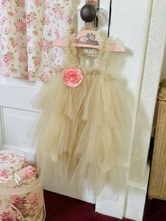 Gorgeous 3 layered ruffled tulle dress adorned with an old ribbon rose, in excellent like new condition. Size 3T, 16 inches from nape to hem. The last pictures show it displayed with other dresses. Thank you for looking! Girls Tulle Dress, Ribbon Rose, The Last Picture Show, Dress Beige, Ribbon Roses, Vintage Girls, Pink Ribbon, Tulle Dress, Wedding Basket