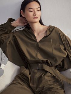 This mini dress is designed with an oversized silhouette adding volume to the A-line shape. Crafted from premium organic cotton woven in Turkey, the long sleeve shirt-dress features a slit neckline with drawcords and large, cuffed sleeves. Wear on its own for more impact or tucked into high-waisted trousers for an edgy look.

 

Resort 2024 is a capsule of elevated, everyday staples and evening pieces designed with an unmistakable air of effortless sexiness.

 

Each purchase you make helps us g Effortless Workwear, Large Belt, Resort 2024, Edgy Look, Cargo Pant, Oversized Silhouette, Long Sleeve Shirt Dress, High Waisted Trousers, Cuff Sleeves