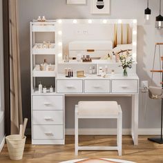 a white vanity with lights on it in a room