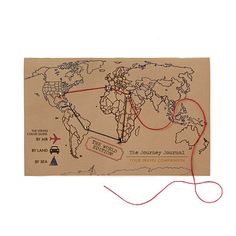 a map with pins on it and some red string