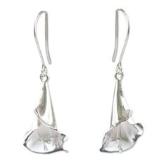 Calla lilies are believed to symbolize magnificent beauty and so inspire the design of these earrings by Regina Flores Montes. The luminous silver earrings are crafted by hand with extraordinary detail. .950 Silver Silver Petal-shaped Earrings For Gift, Silver Teardrop Flower Earrings In Sterling Silver, Elegant Hypoallergenic Silver Flower Earrings, Delicate Silver Petal Earrings, Silver Dangle Flower Earrings For Formal Occasions, Elegant Flower Shaped Earrings With French Hook, Elegant Floral Earrings With French Hook, Formal Silver Drop Flower Earrings, Elegant Flower Earrings With French Hook