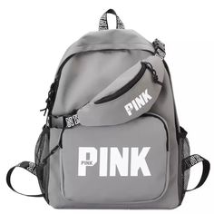 Gray W/“Pink” Fashion Nylon Backpack Bag And Waist Bag Set. Feature: 2 Mesh Side Pocket 1 Front Zippered Closure Inside Padded Pocket Adjustable Shoulder Strap Length: 17” W: 13” Waist Bag Has A Front And Back Zippered Pocket Material: Nylon Color: Gray No Brand Sporty Back To School Bags, Casual Pink Backpack, Trendy Pink Nylon Backpack, Pink Large Capacity Sporty Backpack, Casual Large Capacity Pink Backpack, Sporty Pink Everyday Backpack, Sporty Everyday Pink Backpack, Sporty Pink Backpack For Everyday, Pink School Bags