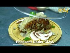 a plate with food on it and the words pheasant under glass written below