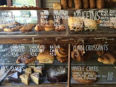 a display case filled with lots of different types of pastries