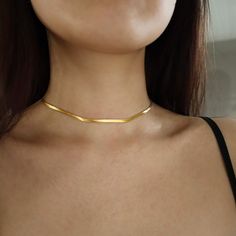 ❤More Style at https://www.etsy.com/ca/shop/HintFineJewelry PLEASE READ BEFORE PLACING YOUR ORDER. ----------------♥ MATERIAL ♥-------------------- Real 18-Karat Gold PVD coating on Stainless Steel.  Physical Vapor Deposition is the 10 times stronger coating process that makes the gold plating last for years to come! Better yet? It is also: *HYPOALLERGENIC *ANTI-TARNISH / WATER-RESISTANT *DOES NOT TURN BLACK OR GREEN ----------------♥ SIZE ♥-------------------- LENGTH: 13 or 14inches, with 2 inc Simple Gold Necklace, Gold Snake Chain, Gold Necklace Simple, Layered Chokers, Herringbone Necklace, Gold Snake, Gold Choker, Choker Necklaces, Chain Choker