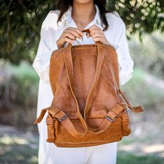 This stunning backpack is made of genuine soft nappa leather in a Honey Brown color. With enough room for all your daily essentials, It is perfect for everyday use, as well as for laptops of all sizes, IPAD, A4 files, books and travel. it as a unique structured with a zipper closure at the top, and three outside zipper pockets for mobile, keys, etc. It is fully lined with black strong cotton fabric which I divide to two large interior, zip pocket, and a leather cell phone pocket, shoulder strap Brown Faux Leather Standard Backpack, Leather Backpack With Large Capacity For On-the-go, Brown Softback Backpack For Daily Use, Large Capacity Brown Leather Backpack For On-the-go, Brown Leather Backpack With Large Capacity For On-the-go, Brown Leather Backpack Large Capacity For On-the-go, Brown Faux Leather Backpack For On-the-go, Brown Faux Leather Backpack For Everyday Use, Versatile Faux Leather Rectangular Backpack