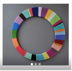 a colorful circle made out of colored strips