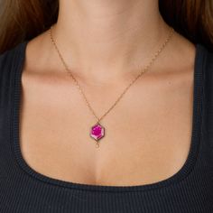 A vibrant rose cut ruby is wrapped in warm 22k gold, and accented with a twinkling diamond drop. Backed in sterling silver, set on a 14k gold chain. Pendant, including diamond drop, measures approximately one inch in length. Matte finish. Gold Drop Jewelry With Rose Cut Diamonds, Yellow Gold Drop Jewelry With Rose Cut Diamonds, Gold Ruby Drop Jewelry, Gift Rose Cut Diamond Drop Jewelry, Rose Cut Diamond Drop Jewelry Gift, Gift Rose Cut Drop Diamond Jewelry, Gold Teardrop Pendant With Rose Cut Diamonds, Teardrop Pendant With Rose Cut Diamonds For Gifts, Gold Octagon Jewelry With Rose Cut Diamonds