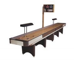 an image of a bowling table set up with lights on the top and two shuffle tables at the bottom