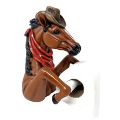 a horse figurine is holding a roll of toilet paper and wearing a cowboy hat