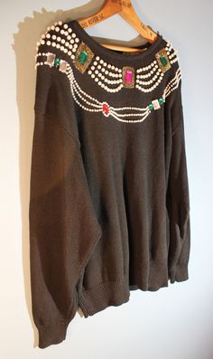 "Vintage, 1980s, Lindsey Blake Editions beaded rhinestone sweater. RN 43952. Has built-in shoulder pads. In overall nice condition without rips or stains. 55% Ramie 45% Cotton Women's Medium | Size 38/18 Length, 28\" Underarm to underarm, 23\" Sleeves, 22\"" Aubergine Dress, Rhinestone Sweater, Wingtip Oxford Shoes, 80s Sweater, Womens Sweaters, Wingtip Oxford, Decor Shop, Sweater Blouse, Black Beads