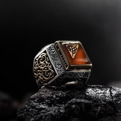 Attention : This ring is completely handmade by silver masters! Ottoman Fire Amber Stone Monogram Design 925K Silver Engraved Ring  This incredible silver men ring is engraved from 100% handmade. This shiny Amber gemstone ring, has a modern and vintage vibe for daily using. You can use it for daily or special days. The engraving details of pure 925 Sterling Silver Handmade Ring are very detailed and eye-catching. You can prefer this vintage style silver ring like gift for your friends or family. It's a perfect gift for birthday, Ramadan, valentine's day, International Women's Day, anniversary, statement(cocktail) or christmas. Item Details: * Gender : Man/Woman * Material : 925K Sterling Silver * Total Weight: 18gr! *Ready to Ship in 1-5 Business Days! ( Because it is handmade  ) *Free Exp Islamic Ring, Man Jewelry, Luxury Gifts For Men, Man Ring, Amber Gemstone, Engraved Ring, Ramadan Gifts, Men Ring, Amber Stone