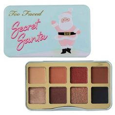 The Too Faced Secret Santa Eye Shadow Palette is the ultimate gift for makeup enthusiasts and beauty lovers looking to add a touch of magic to their holiday looks. With its exquisite range of shades curated to enhance your eyes, this palette offers endless possibilities to create stunning eye-catching looks, making it a must-have in your collection. Featuring a delightful selection of 16 vibrant, high-pigmented eyeshadows, the Secret Santa Palette guarantees a palette of possibilities to let you Too Faced Palletes, Too Faced Christmas Palette, Too Faced Eyeshadow Palette, Too Faced Gingerbread Palette, Chocolate Bar Too Faced, Gifts For Makeup Lovers, Santa Mini, High Pigment Eyeshadow, Office Holiday Party