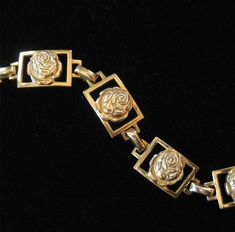 This is a sterling silver bracelet by Coro with gold vermeil. The bracelet has a rose pattern. It is marked "DES PAT PEND" on the back of one link and "STERLING CRAFT by CORO" on another link. This piece is from the late 1940's at my best estimate. This piece is 6 3/4 inches long and 1/2 inches wide. This piece will fit a small to medium wrist best. This piece is in good condition. The bracelet has wear to the gold plating on the outer most edges. The sterling has use and wear marks, but no majo Adjustable Gold Bracelet With Rose Design, Gold Bracelet With Rose Design For Gift, Sterling Silver Bracelet, Rose Pattern, A Rose, Gold Plating, Sterling Silver Bracelets, Gold Vermeil, Arm Band