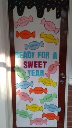 a door decorated with candy for a sweet year