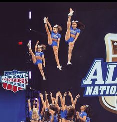 the cheerleaders are doing stunts for the national cheerleader association competition on stage