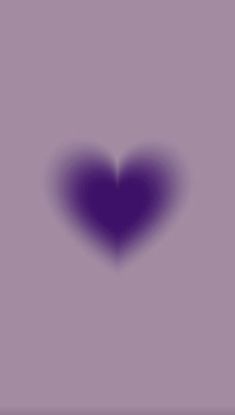 a purple heart is shown in the middle of an image with a shadow on it