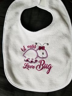 Embroidered baby bib for your child or for that someone you know. Or even for a child's special doll. Give that new baby a gift that they will use over and over, while showing off their personality. Thread Color: The colors on your computer/laptop/phone/tablet may differ slightly from what colors used on the finished product. All items are handmade to order. Velcro enclosure. 75% Cotton, 25% Polyester, for easy cleaning. Washing Instructions: Machine wash cold, line, air, or cold dry. Processing Time: All orders are 5-7 days. Items are shipped through USPS First Class Mail with a tracking number, within the United States. If you have any questions, please feel free to message me. Pink Cotton Bib As A Gift, Pink Cotton Bib As Gift, Customizable White Bib For Babies, Personalized Cotton Bib As Gift, Cute Pink Bib As A Gift, Cute Pink Bib For Gift, Cute Pink Bib As Gift, Cute Machine Washable Bib As Gift, Playful Cotton Bib As A Gift