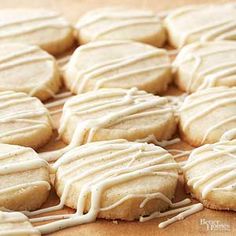 iced cookies with icing on a wooden surface