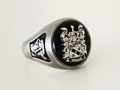 "Your custom solid sterling Silver ring will be made on your order, customize this Coat of Arms and your logo on this collection! A beautiful symbol that will fit your hands and style. perfect gift for anniversary, special dates and any date you can imagine can be Personalized. Different colors are silver, gold, rose gold. White gold and 24K gold options will never tarnish and last decades. Please contact me if you are interested in my jewelry. >ABOUT ME: I have 35 years of experience in making custom handmade silver and gold jewelry, including custom engraved Signet rings My childhood kind of allowed me to live among precious metals and gems pretty much I opened my workshop back in 1986 Never got bored of making Personalized gifts, birth flower rings, engagement rings with real diamonds F Custom Oval Signet Ring For Formal Occasions, Custom Oval Engraved Ring With Polished Finish, Custom Engraved Oval Ring With Polished Finish, Custom Oval Hallmarked Signet Ring, Custom Oval Sterling Silver Signet Ring, Custom Oval Signet Ring With Polished Finish, Custom Oval Engraved Ring Collectible, Custom Oval Engraved Collectible Ring, Custom Silver Signet Ring For Formal Occasions