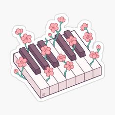 a piano with flowers on it sticker