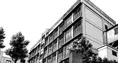 a black and white drawing of an apartment building