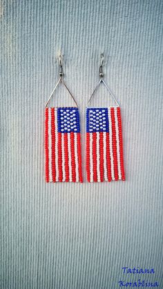 These handmade earrings are made of high-quality Czech beads and strong synthetic thread. These unique festival earrings I use my author's scheme USA flag. They are elegant, fashionable, and highly versatile, suitable for everyday wear. Color: red,white, blue USA Flag Color .Independence Day   100% hand made with love!  Copy without my permission is prohibited  Measurements: Length with hook - near 9 cm( 3.54 inch ),Width - 2.5cm (0.8 inch) Materials: Silver plated ear hooks Czech glass beads Ny Patriotic Earrings For Summer Gift, Blue Patriotic Earrings For Independence Day, Patriotic Blue Earrings For Independence Day, Patriotic Dangle Earrings For Independence Day, Patriotic Multicolor Earrings For Independence Day, Handmade Blue Earrings For 4th Of July, Patriotic Multicolor Beaded Earrings, Patriotic Beaded Earrings For 4th Of July, Handmade Patriotic Dangle Earrings