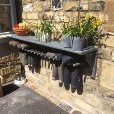 39 Simple Shoe Storage Ideas That Will Declutter Your Hallway | Posh Pennies Front Porch Boot Storage, Diy Metal Clothes Rack, Welly Rack, Inside Cabin, Gardening Boots, Dirty Boots, Boot Rack, Boot Storage, Garden Boots