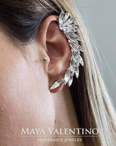 "Rose gold ear cuff, Ear crawler, Ear warp, Crystal ear cuff, Ear cuff, Ear cuffs, Ear climber, Bridal Earrings, Wedding earrings, Gift for her Amazing special large abstract crystal ear cuff earrings, definitely one of my best designs, we sure that you will grab a lot of positive compliments and definitely will upgrade any out fit. Designed and created by Maya Valentino & Co. All right reserved. Embellished with lovely sparkling crystals from Swarovski! 💜Left or right option automatically Rose Gold Ear Cuff, Climbing Earrings, Crystal Ear Cuff, Shiny Earrings, Ear Cuff Earrings, Ear Crawler, Ear Crawler Earrings, Gray Jewelry, Gray Earrings