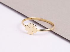 "ABOUT PRODUCT This 14K Gold Four Leaf Clover Ring is suitable gift for girlfriend, mom and her. You can even buy as a birthday gift for your friends or anniversary gifts, If you want to add a special note we can write for you and put to inside of package. We manufacture our jewelry pieces with carefully and after production we double checking in quality control department. Our main idea is keep our items for daily wearing especially for minimalist jewelry pieces. 14K Yellow Gold Four Leaf Clove 14k Gold Hallmarked Flower Ring As Gift, Hallmarked 14k Gold Flower Ring For Gift, Hallmarked 14k Gold Flower Ring As Gift, Stackable Flower Ring With Round Band For Gifts, Stackable Flower Ring With Round Band As Gift, Stackable Flower Ring With Round Band, Stackable Flower Ring Gift, 14k White Gold Flower Ring Gift, 14k Gold Flower Ring Gift